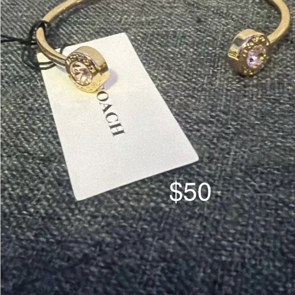 Coach Gold-Tone Bangle with Crystal Accents - Picture 2 of 4